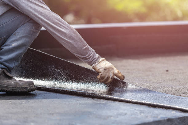 Professional Waterproofing technician working in Hanceville, AL